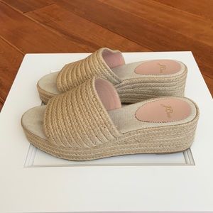 Size 9 lightly worn J Crew natural woven platform sandal